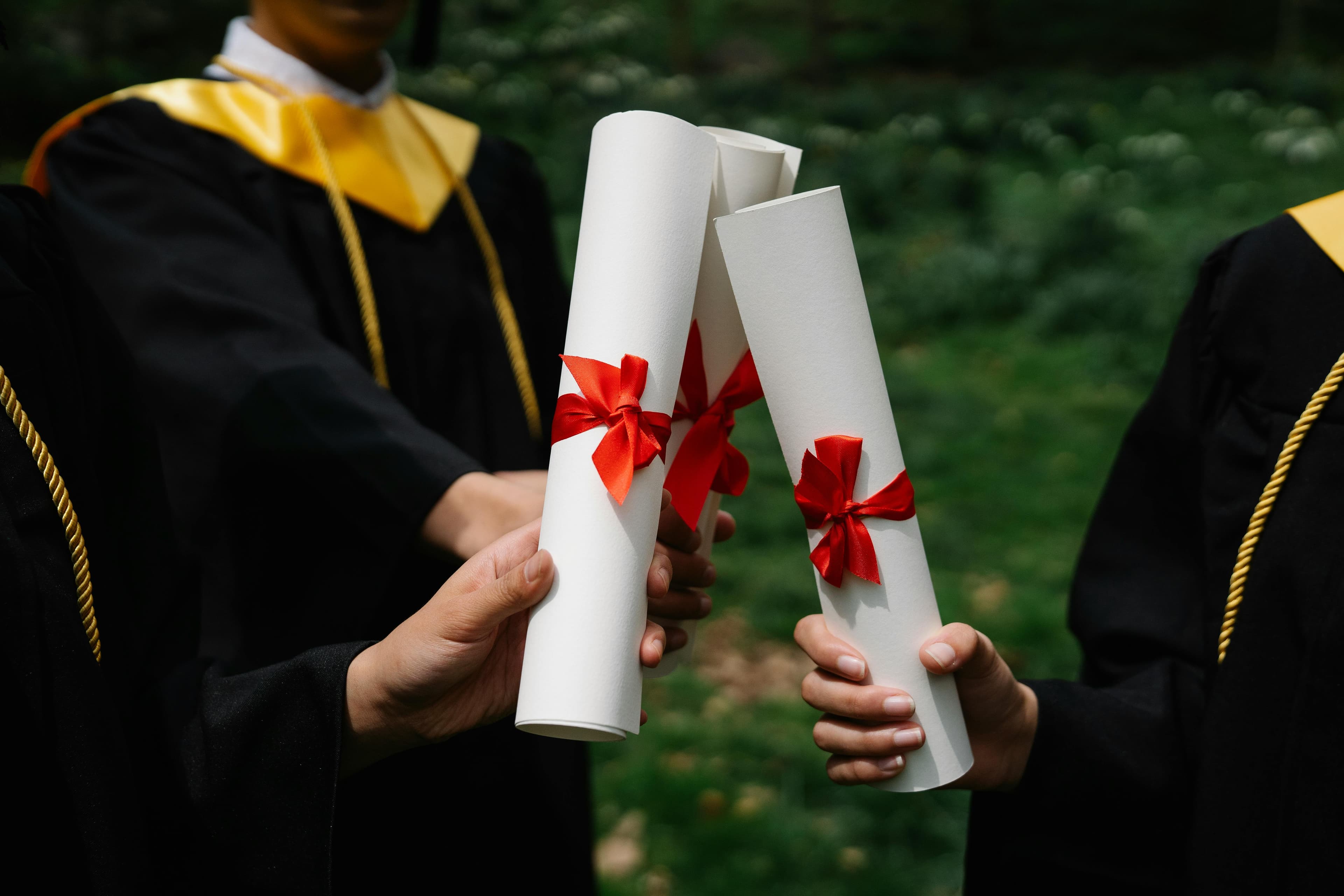 Happy international students celebrating graduation